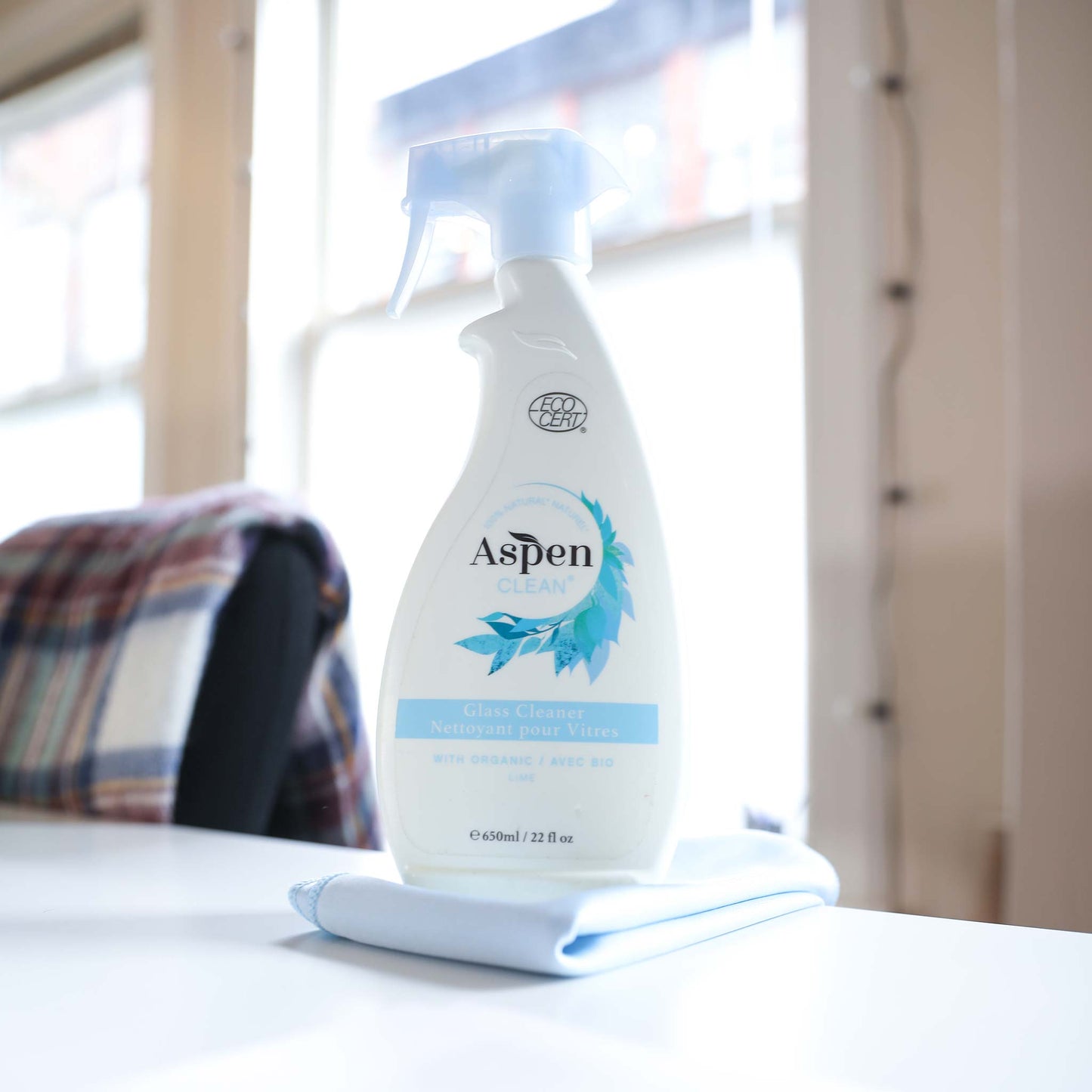 Glass Cleaner and Microfiber Cloth on a table