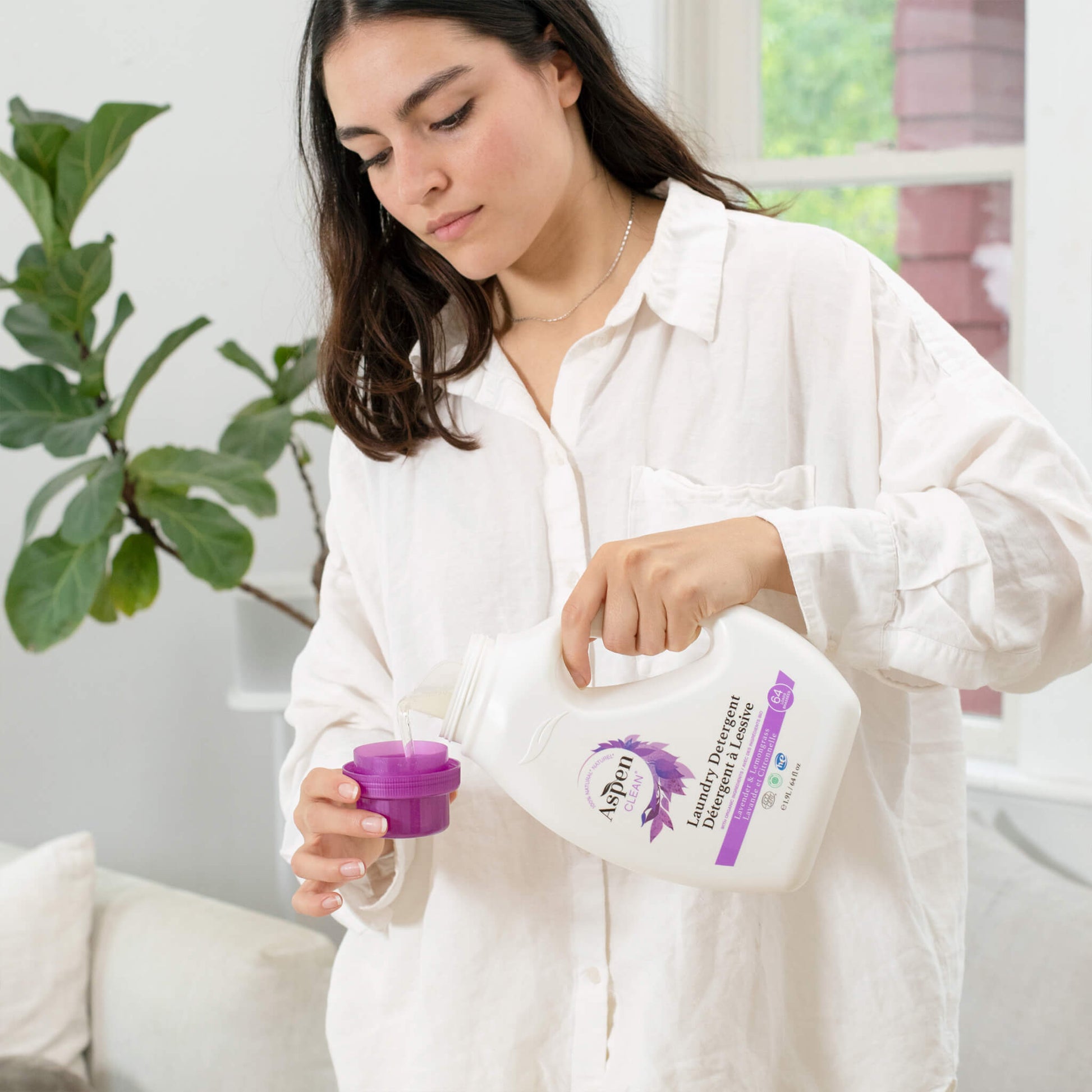 A mom using AspenClean Eco-Mom Cleaning Kit