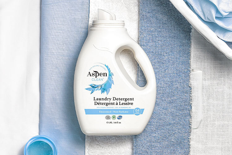 House Cleaning Services using green AspenClean laundry detergent unscented