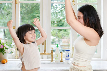 Girl and a mom on the kitchen